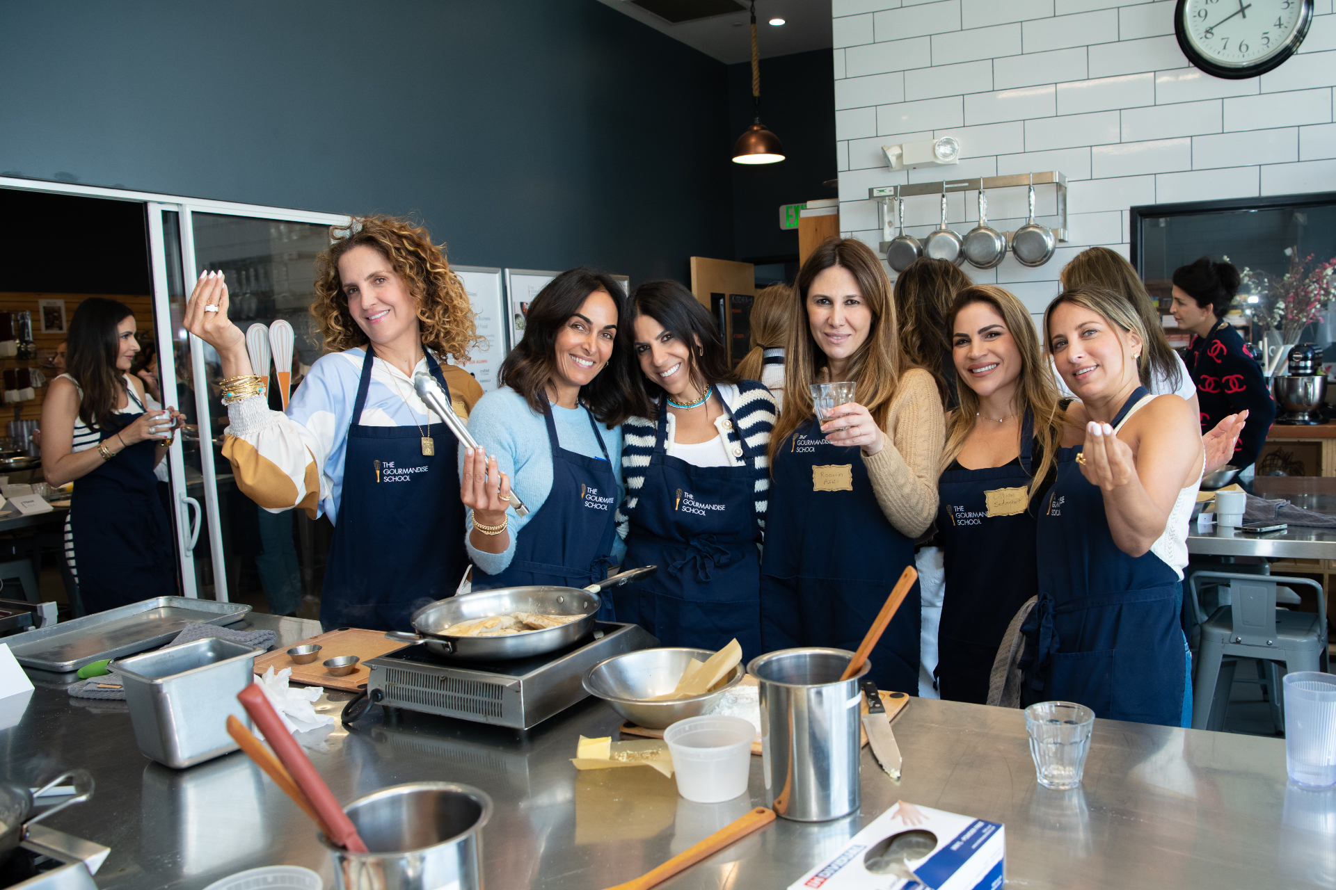 Members cooking together at a community connection gathering
